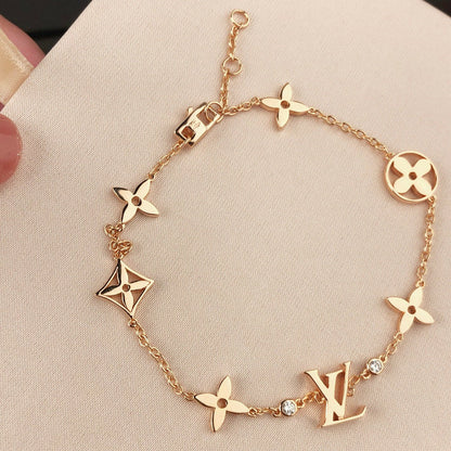 [BIJOUX]星と太陽 7モチーフ ゴールドブレスレット