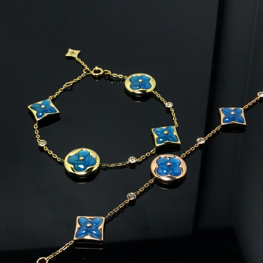 [BIJOUX]BRACELET 4 MOTIFS ÉTOILE ET SOLEIL BLEU